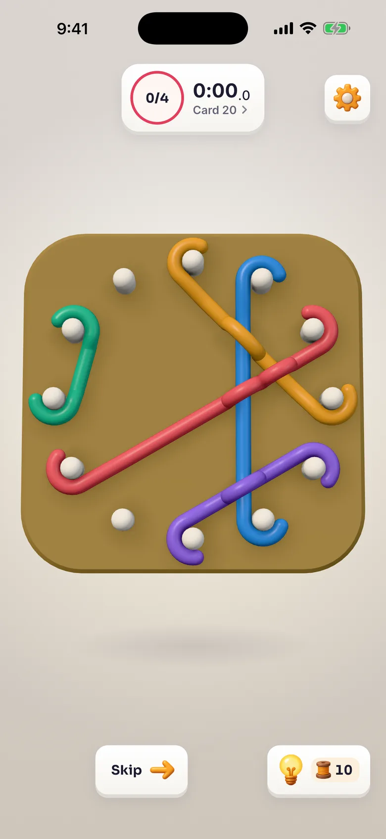 Card 20 in Studio, mid-play: five ropes resting on pegs across a wooden board, some still crossing.